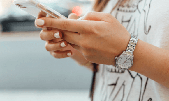 Phone in women hand image