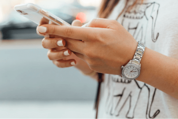 Phone in women hand image